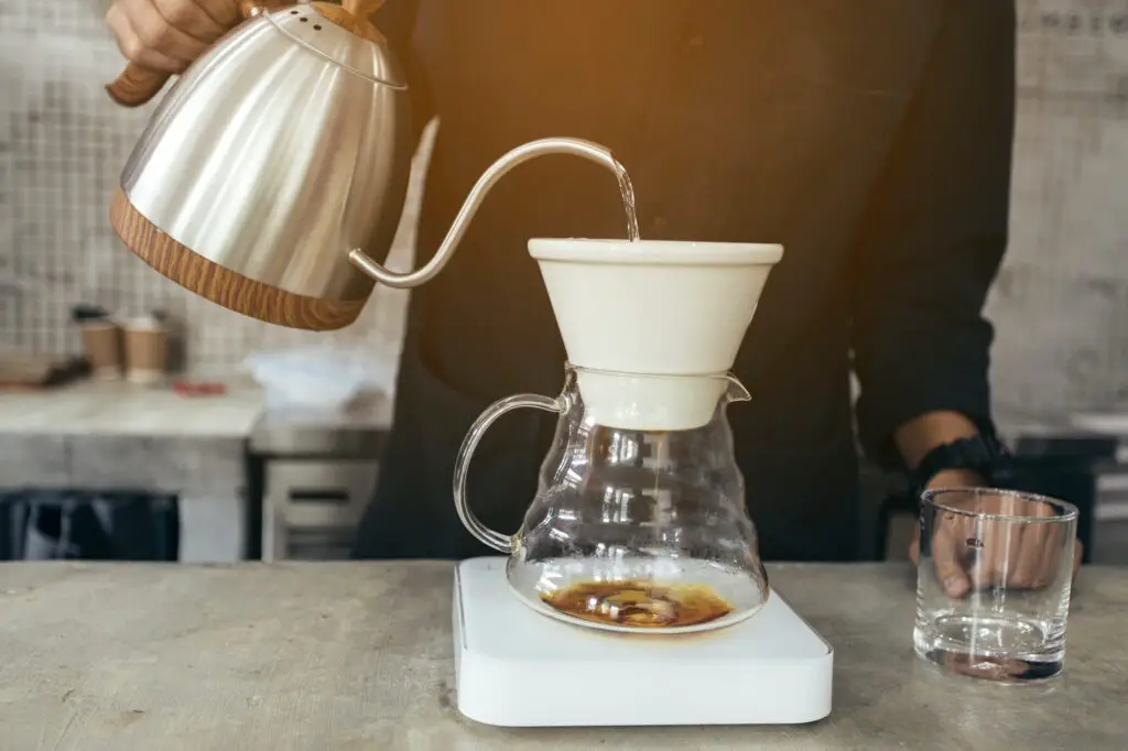 Barista brewing coffee, method pour over, drip coffee