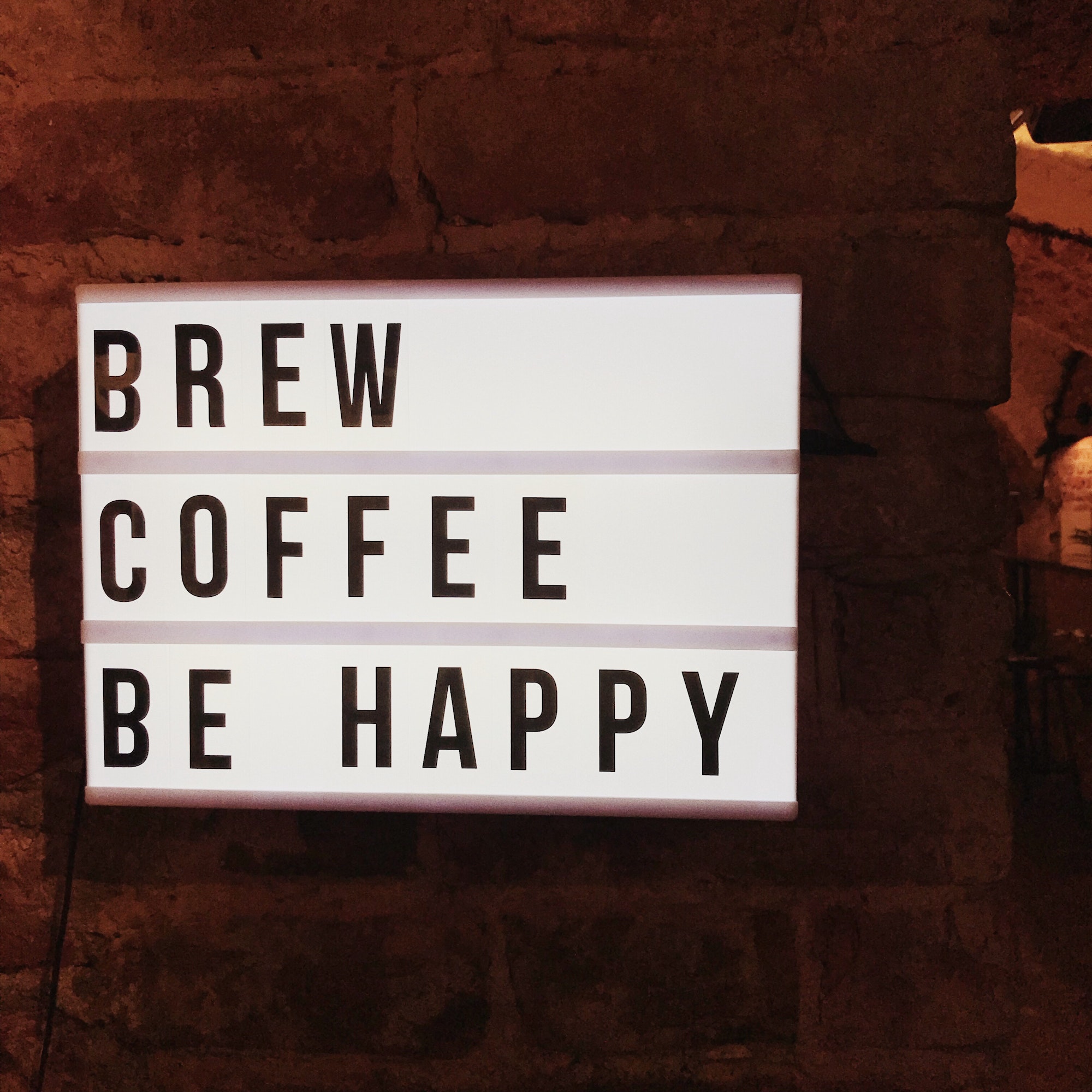 brew coffee be happy sign