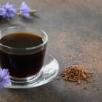 Chicory herbal beverage decorated blue Chicory flowers, coffee healthy substitute.