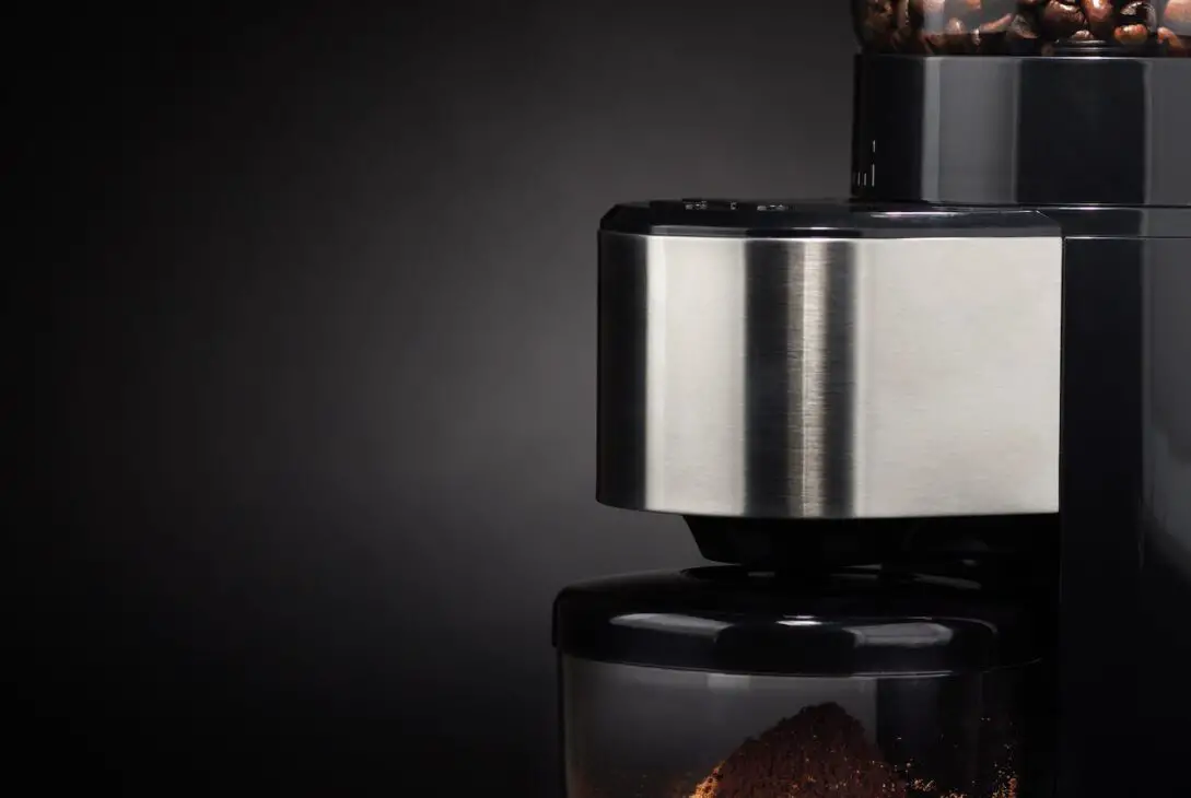 Electric coffee grinder on black